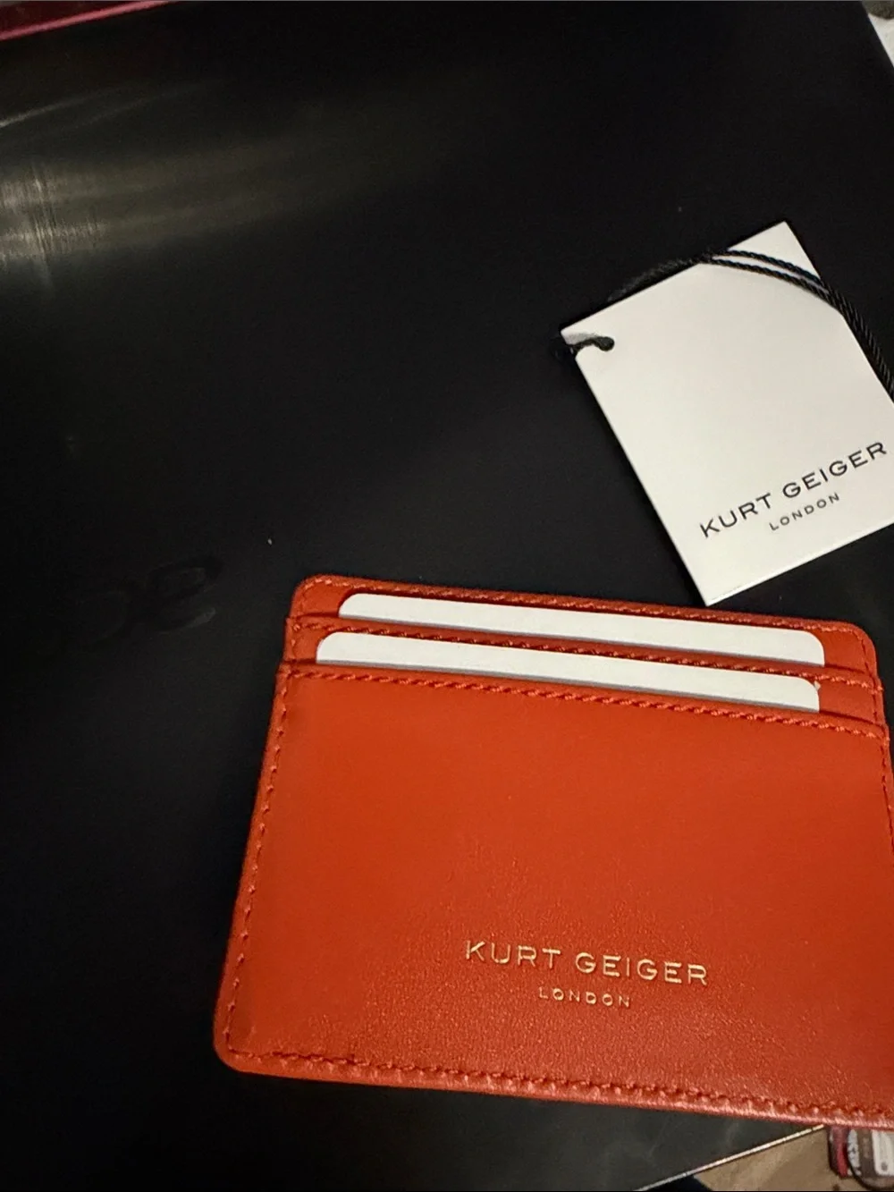 Kurt Geiger Orange Leather Card Holder with Decorative Gold Emblem